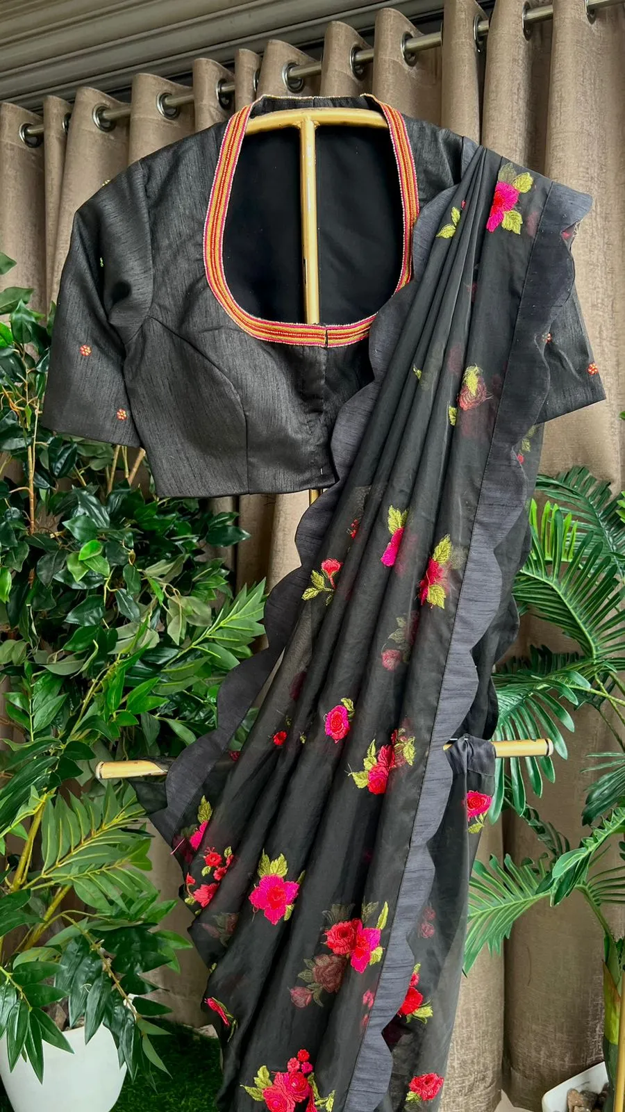 Black organza saree with black handwork blouse